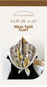 Détail d'un foulard en soie sergée de 90 cm avec des motifs floraux jaunes et gris