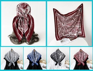 Detail view of retro map print square silk scarves in wine red, navy, and black colors