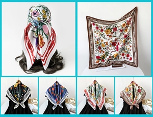 Detail view showing varied floral silk scarves with tulip patterns in a grid layout