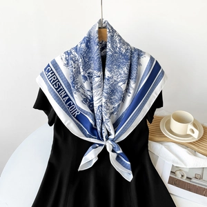 French style silk scarf tied on neck with classic blue Toile de Jouy floral landscape print