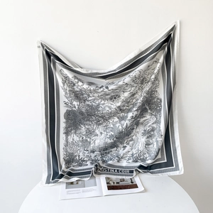 Detail of 90cm silk scarf featuring black and white French Toile de Jouy scenic print