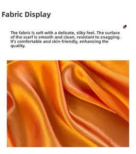 Detailed macro view of smooth orange silk satin fabric with elegant glossy textures