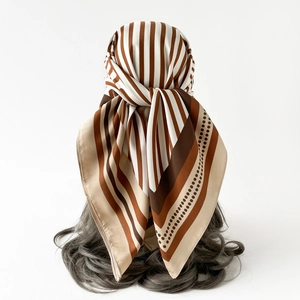 Detail of 90cm striped silk scarf featuring classic brown stripes and polka dot edges