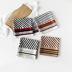 Elegant 90cm striped silk scarf set with modern geometric patterns and smooth satin finish