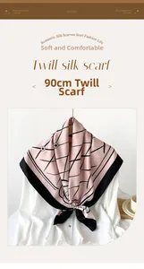 Detail of 90cm pink and black twill silk scarf with geometric pattern on white shirt