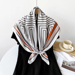 Elegant 90cm striped silk scarf in white and grey with vibrant orange geometric accents