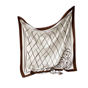 Elegant silk-like square scarf featuring checkered pattern and vintage camellia flowers