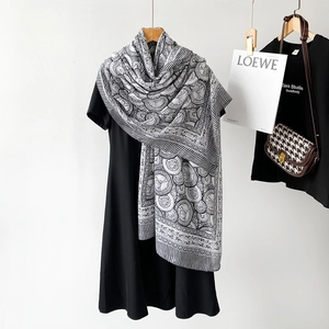 Detail of cotton linen scarf featuring vintage coin patterns and geometric stripes
