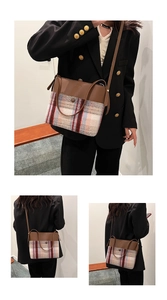 Détail du sac seau en laine à carreaux et cuir marron montrant l'avant et le côté
