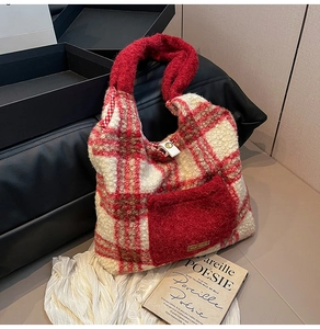 Detailed close-up of plush red and white checkered tote bag with a soft fuzzy pocket