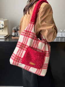 Winter plush tote bag with red plaid pattern and faux shearling trim on shoulder bag
