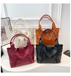 Variety of PU leather tote bags in white, orange, burgundy, and black with metal flower detail