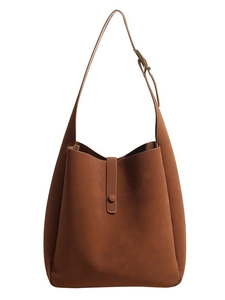 Classic brown leather Hobo shoulder bag with adjustable strap on white background