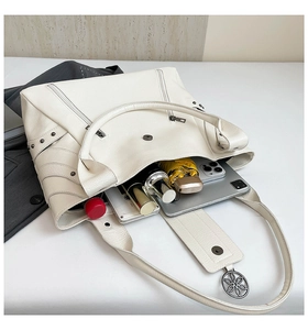 Top view of cream PU leather tote bag interior showing large capacity for tablet and phone