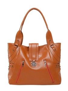 Brown faux leather tote bag with decorative zippers and metal flower logo on white background