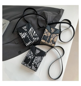 Three creative suit-collar design mini crossbody bags with zebra and snake skin patterns