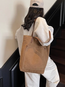 Brown vintage washed canvas tote bag with large capacity and shoulder straps