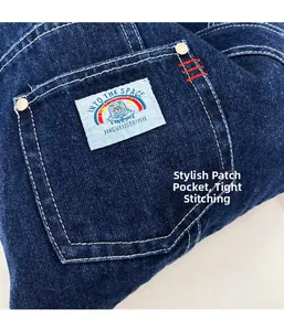 Detail of denim bag with avant-garde patch pocket and high-density white stitching