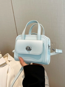 Chic light blue mini satchel bag with silver clasp and twin handles for women