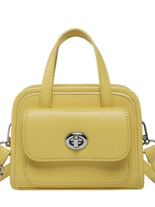 Minimalist yellow PU leather briefcase handbag with a silver turn-lock closure on white background