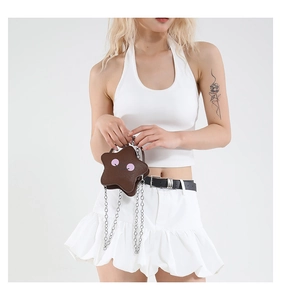 Brown star-shaped mini crossbody bag with smiley face and silver chain strap details