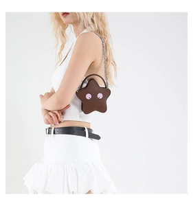 Deep brown star-shaped crossbody bag with litchi grain texture and metal chain