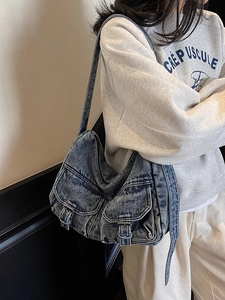 Retro washed denim hobo shoulder bag with utility pockets and metallic buckle details