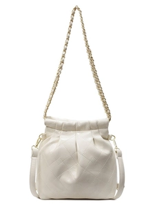 Quilted cream bucket bag with elegant chain strap and smooth faux leather finish