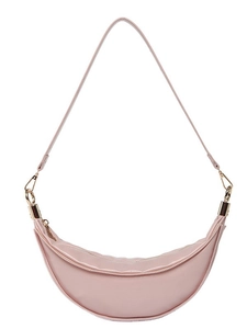 Minimalist pink crescent-shaped crossbody bag with gold hardware and a sleek zipper