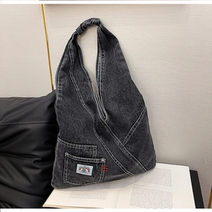 Retro black denim shoulder bag with white contrast stitching and a large capacity hobo design