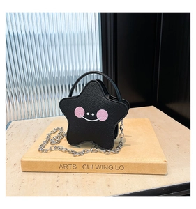 Star-shaped black crossbody bag with a cute cartoon face on litchi grain leather texture