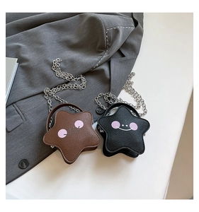 Detail of star-shaped mini bags in brown and black with litchi texture and chain strap