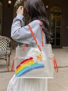 Fashionable semi-transparent PVC beach bag with rainbow print and orange handles