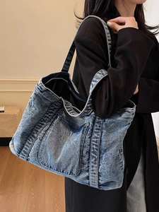 Retro washed blue denim tote bag with large capacity and front pocket for women
