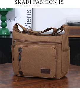 Close-up of vintage brown canvas crossbody bag with multiple pockets and logo detail