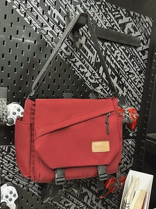 Men's large capacity red messenger bag with tactical flap and dual buckle closures