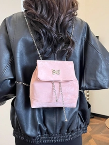 Pink matte mini backpack with silver butterfly metal ornament and slim chain straps