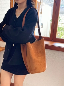 Brown minimalist suede bucket bag with large capacity for women commuting and daily wear