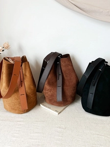 Minimalist faux suede bucket tote bags in camel, brown, and black colors for women
