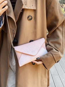 Pink gradient rhinestone envelope clutch with gold chain strap for elegant party styling