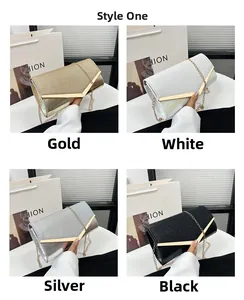 Elegant clutch bags in gold, white, silver, and black with V-shaped metal trim