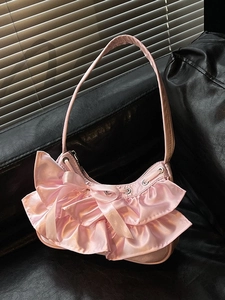 Pink satin hobo bag with ruffle layers and bow detail for 2025 sweet minimalist style