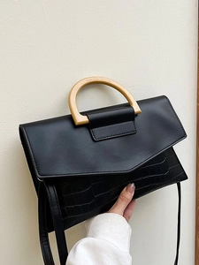 Elegant black crocodile pattern handbag with D-shaped handle and slim shoulder strap