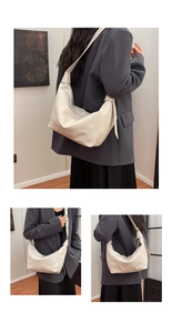 Detail of cream leather crescent bag showing soft texture and slouchy underarm fit