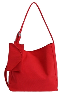 Minimalist red canvas tote bag for women with matching small pouch on shoulder strap