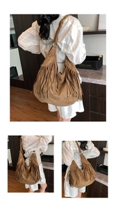 Detailed view of brown suede hobo bag featuring long flowing fringes and large capacity