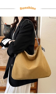 Detail of yellow corduroy tote bag with black and white zebra pattern wide strap
