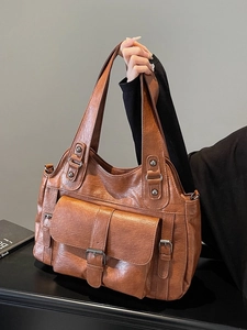 Brown vintage leather tote bag with large capacity for commuting and daily use