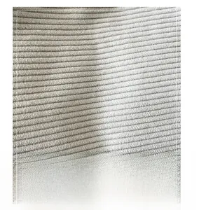 Detailed close-up showing the soft striped texture of the beige canvas shoulder bag