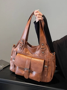 Vintage brown large capacity tote bag in soft leather with buckle detail and front pocket